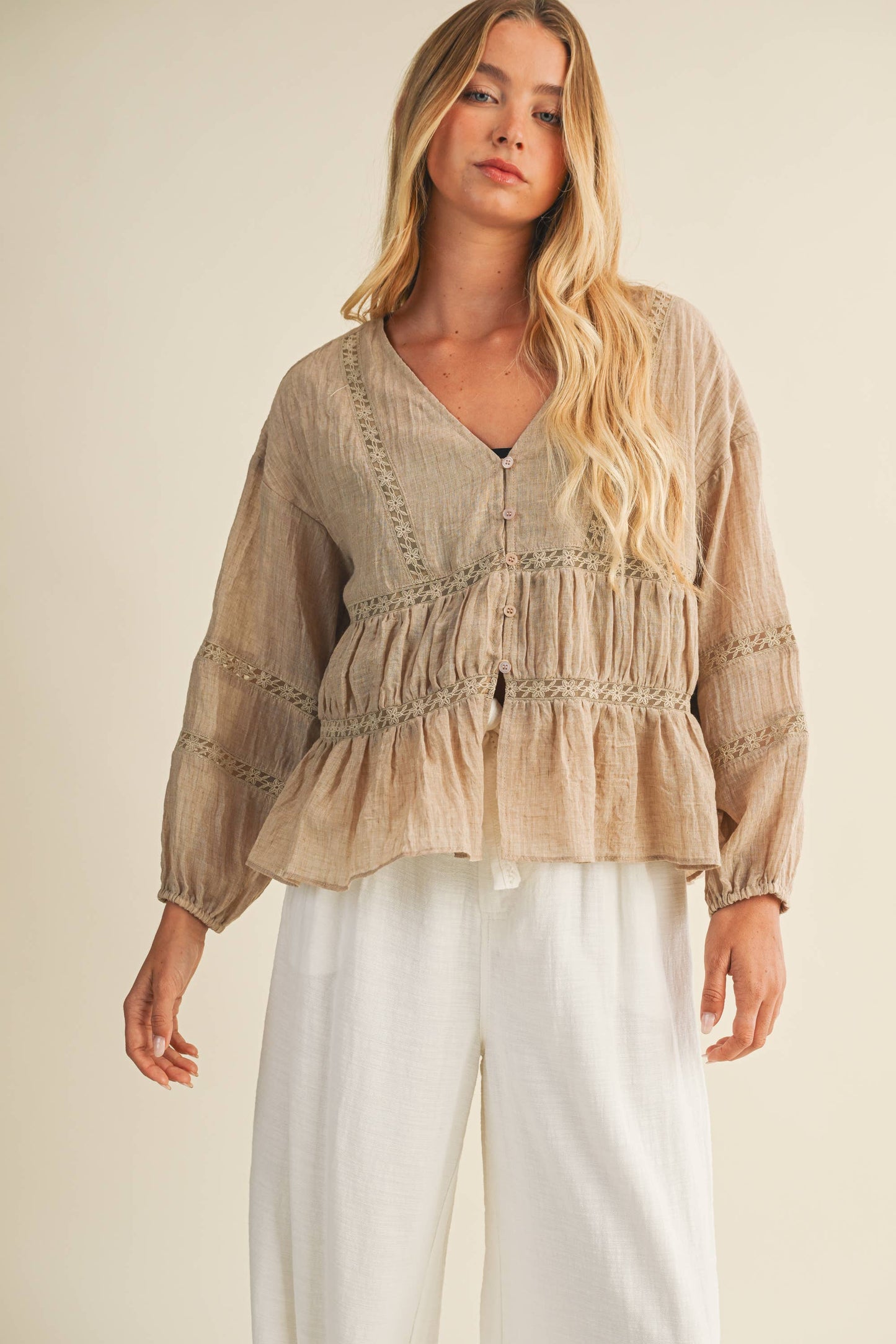 taupe ruffle blouse