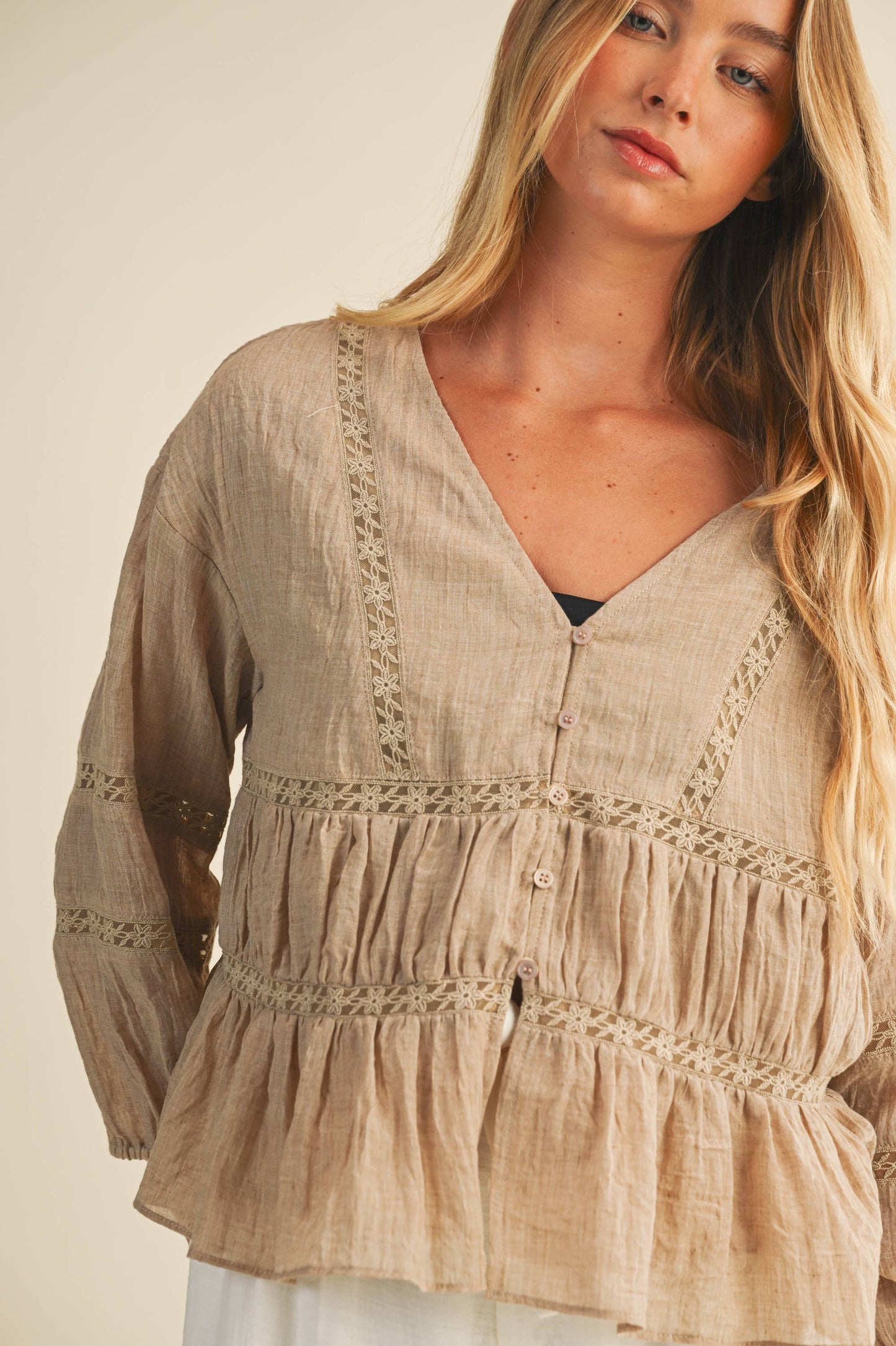 taupe ruffle blouse
