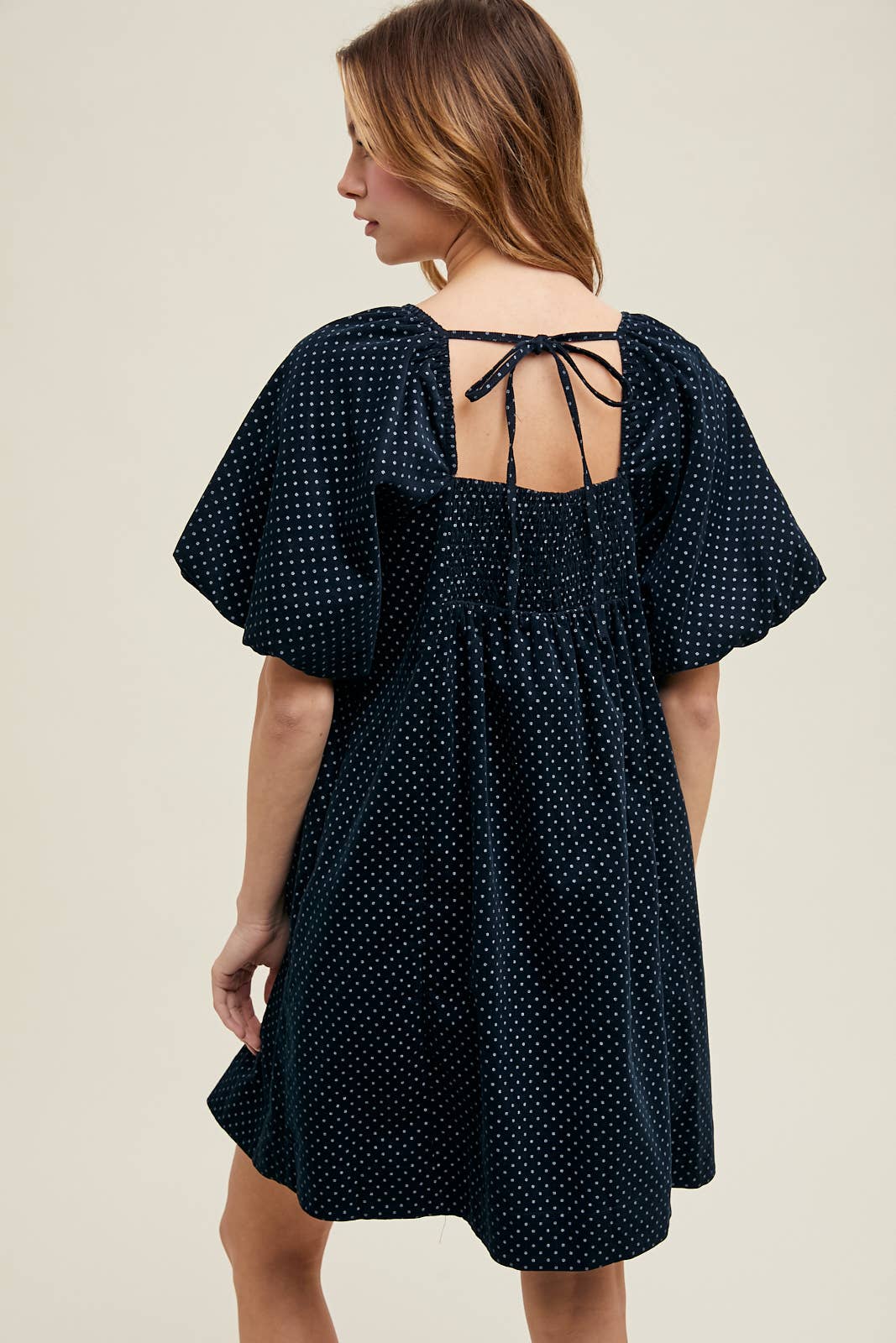 navy polka dot mini dress
